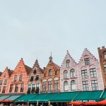 colorful 4 story buildings with pointed roofs