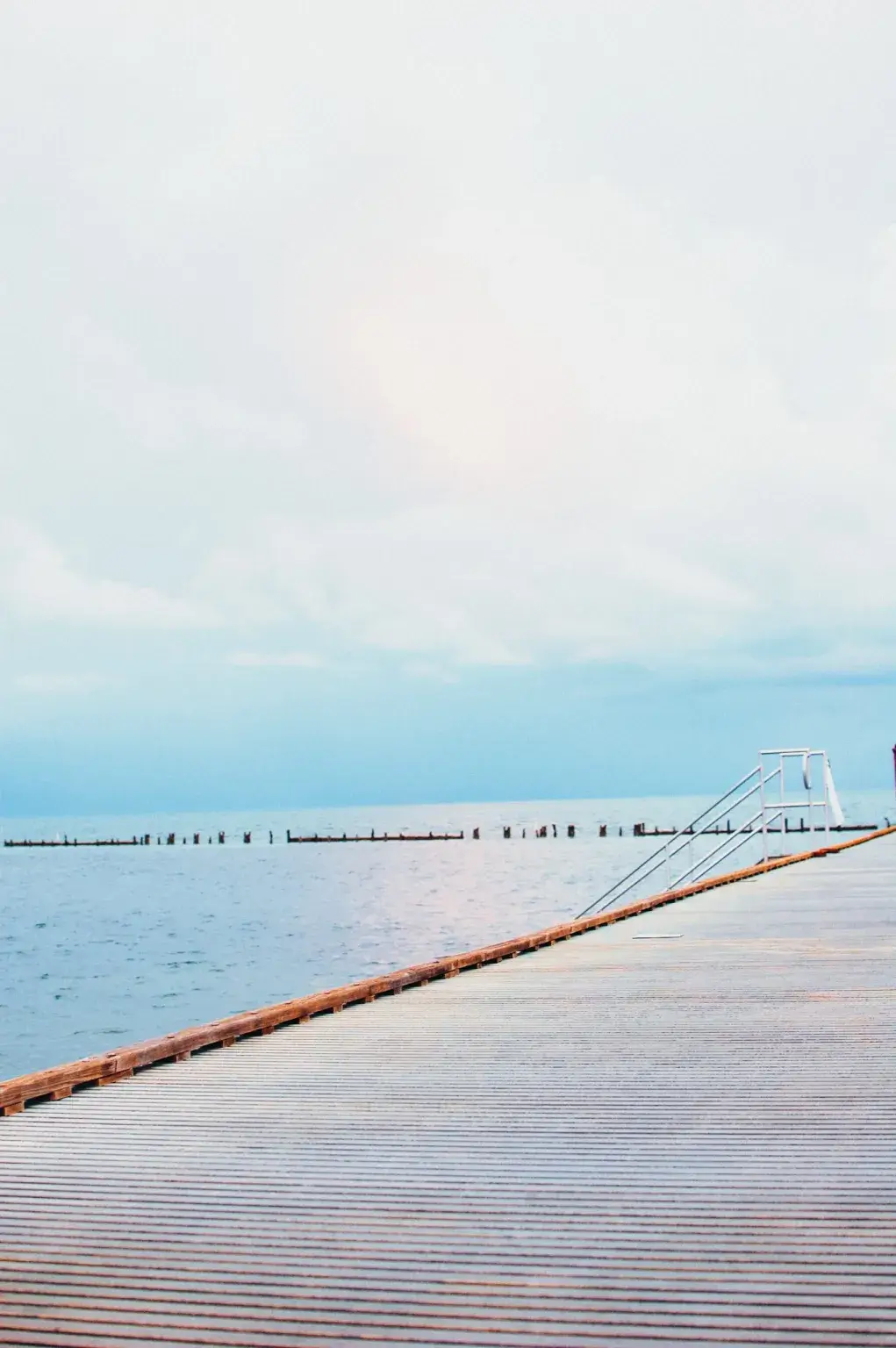 Higgs Beach Pier in Key West, Florida with stairs going into the water