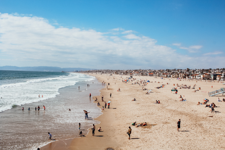 Large sandy beach in Los Angeles with people sunbathing