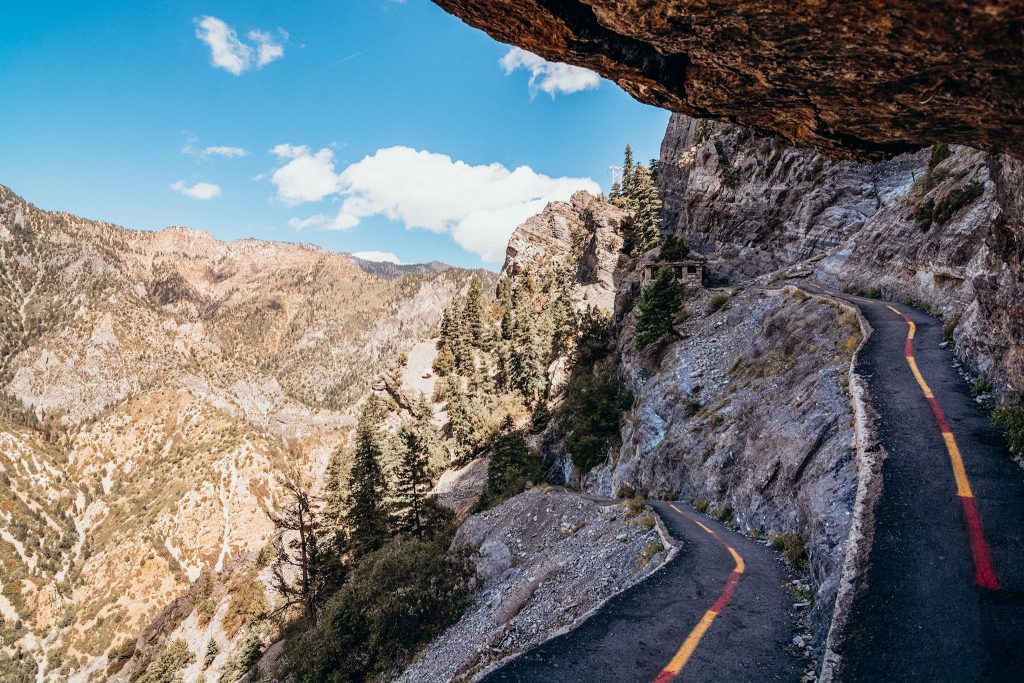 Paved switchbacks leading up mountain side in American Fork Canyon 