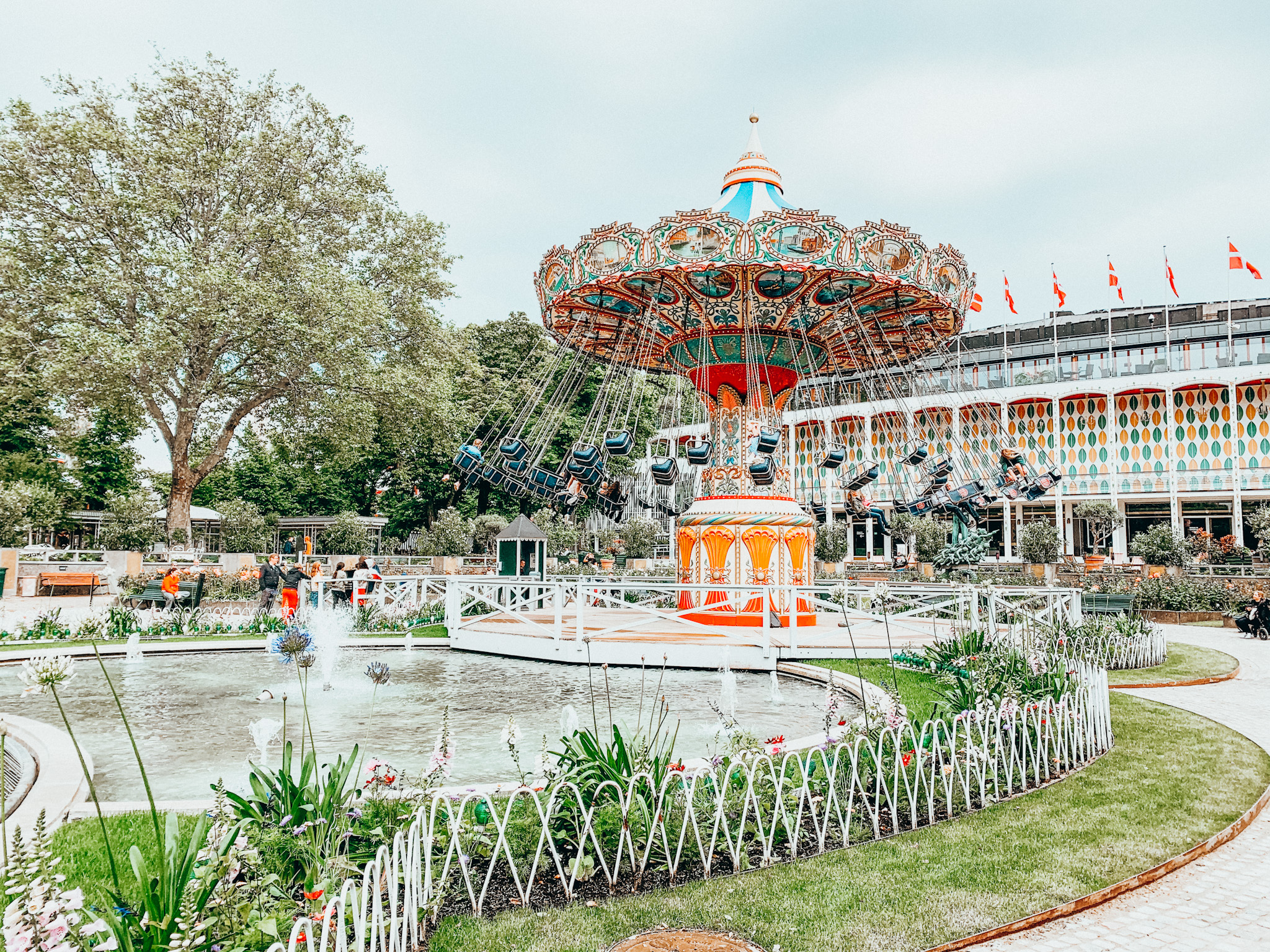 Bright and colorful swing ride at Tivoli Gardnes
