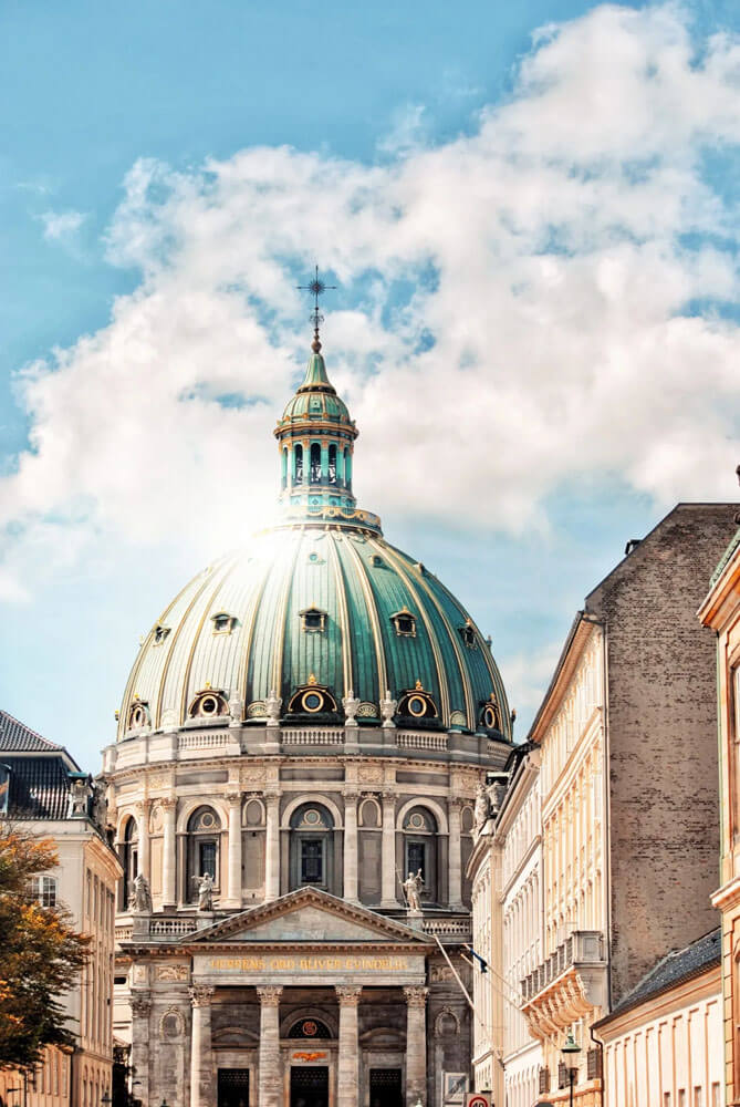 Large dome church with green and gold ornate roof in Copenhagen