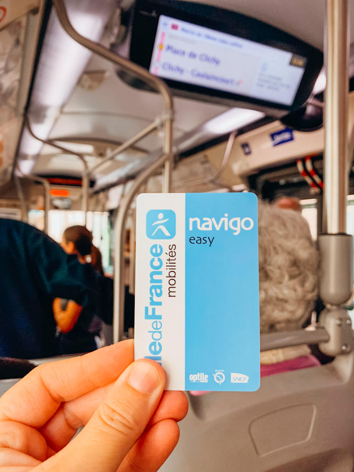 Blue and white paper travel pass in Paris