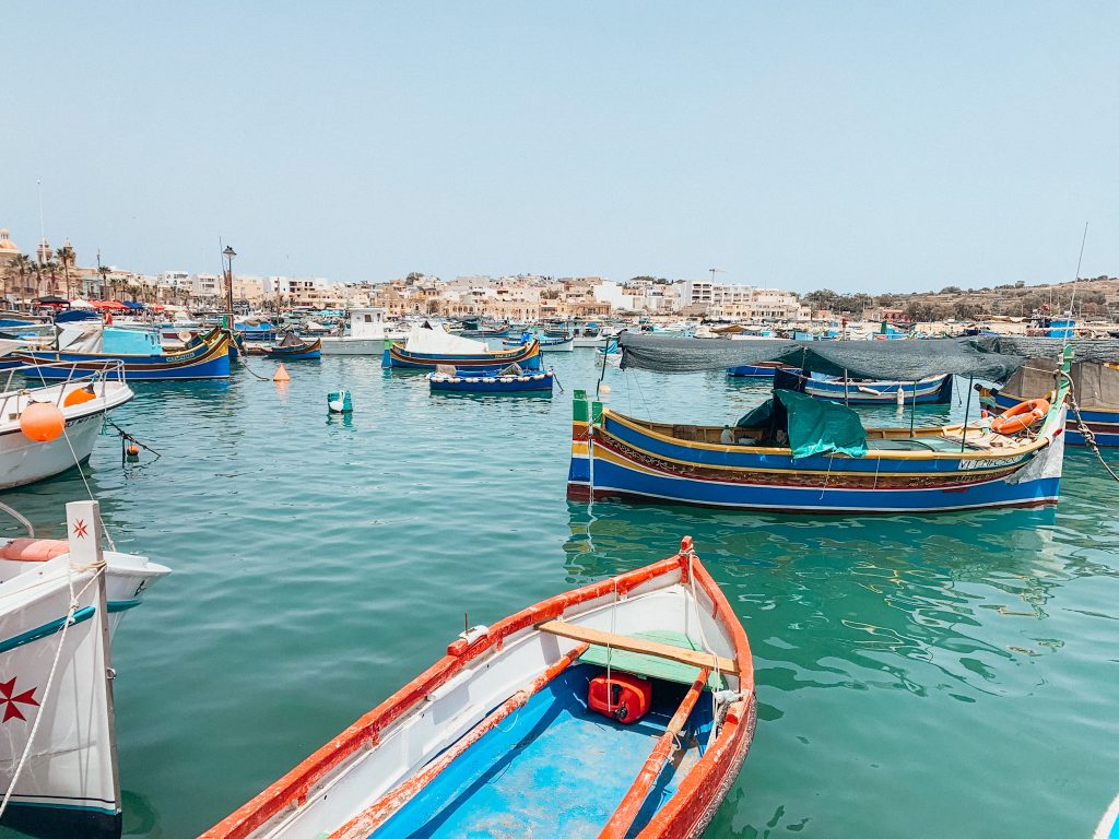 Colorful boats floating in harbor