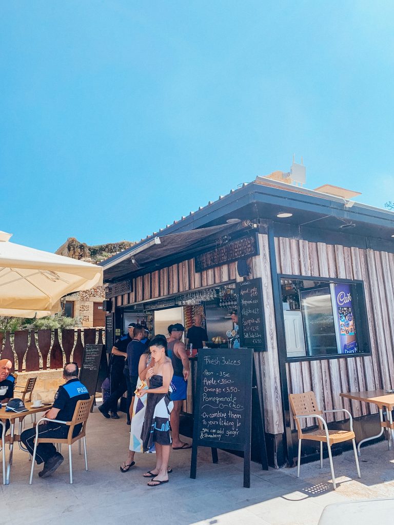 Brown and black building selling drinks and food