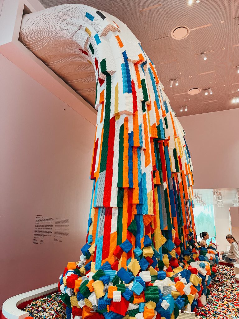 Colorful rainbow waterfall made of LEGO bricks within the LEGO House in Billund Denmark