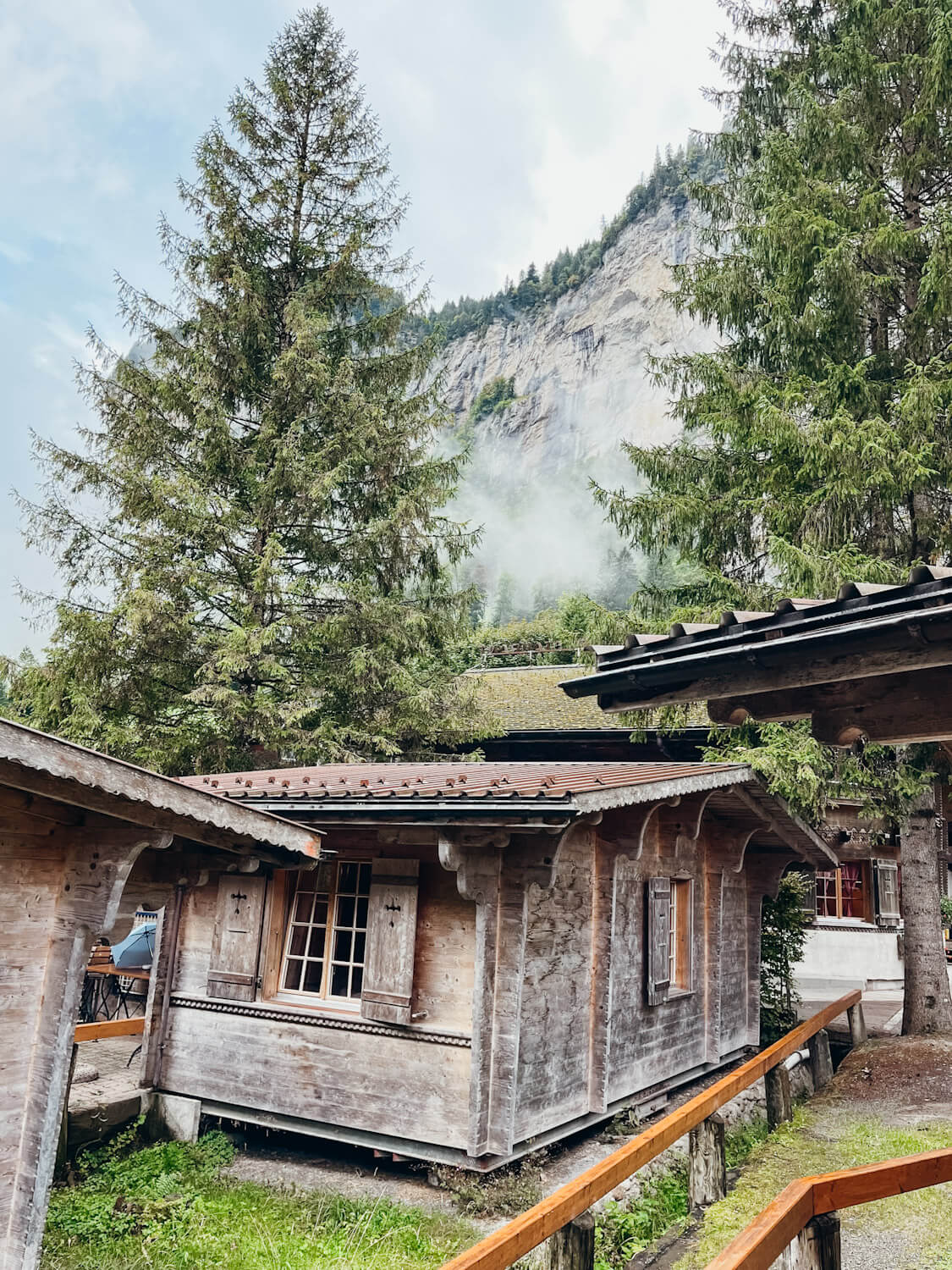 Grouping of wooden bungalows at Camping Jungfrau in Switzerland