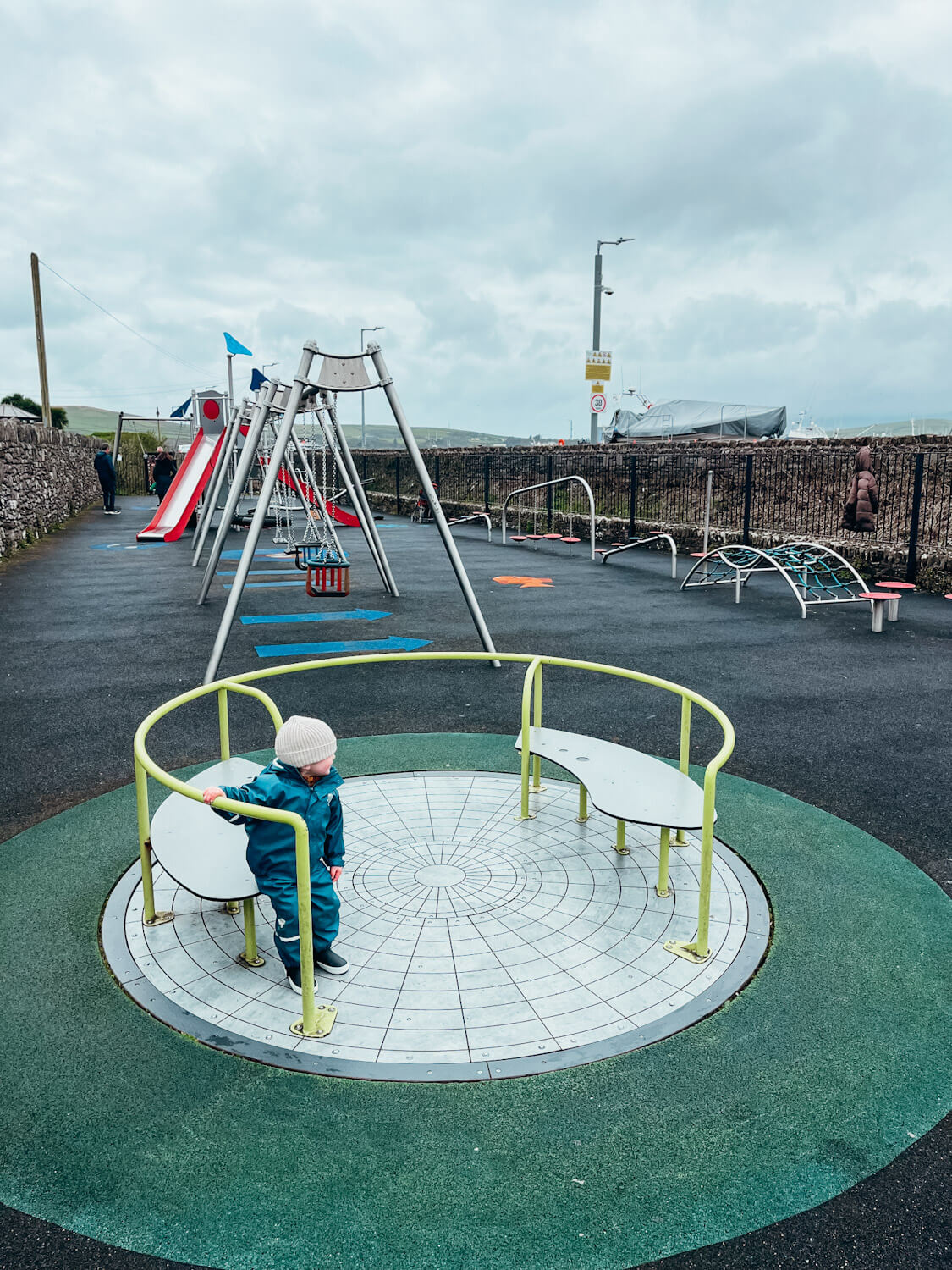 Child on a play toy at the Dingle Town playground