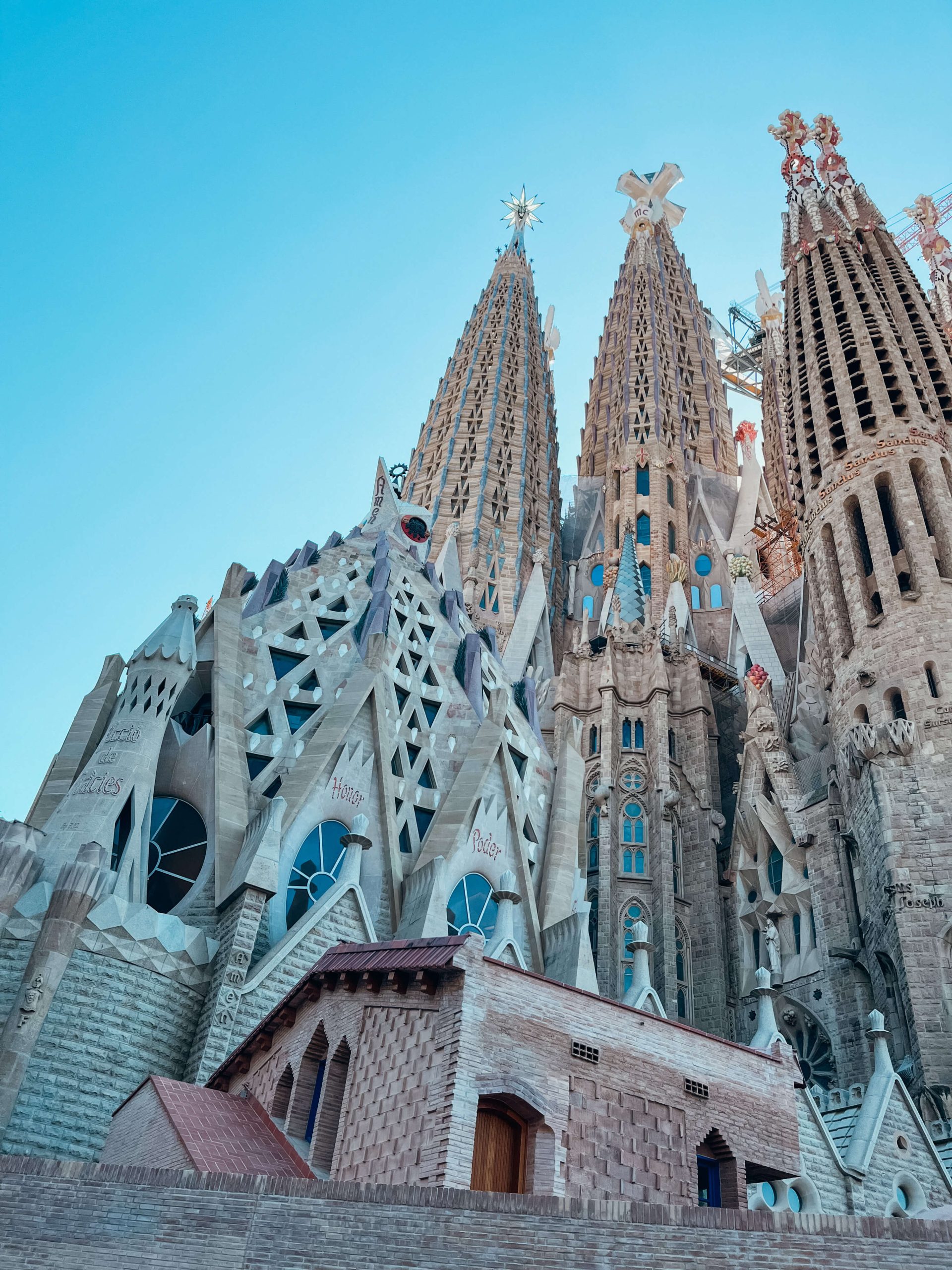 Close up view of Sagrada Familia's ornate stone work and mosaics