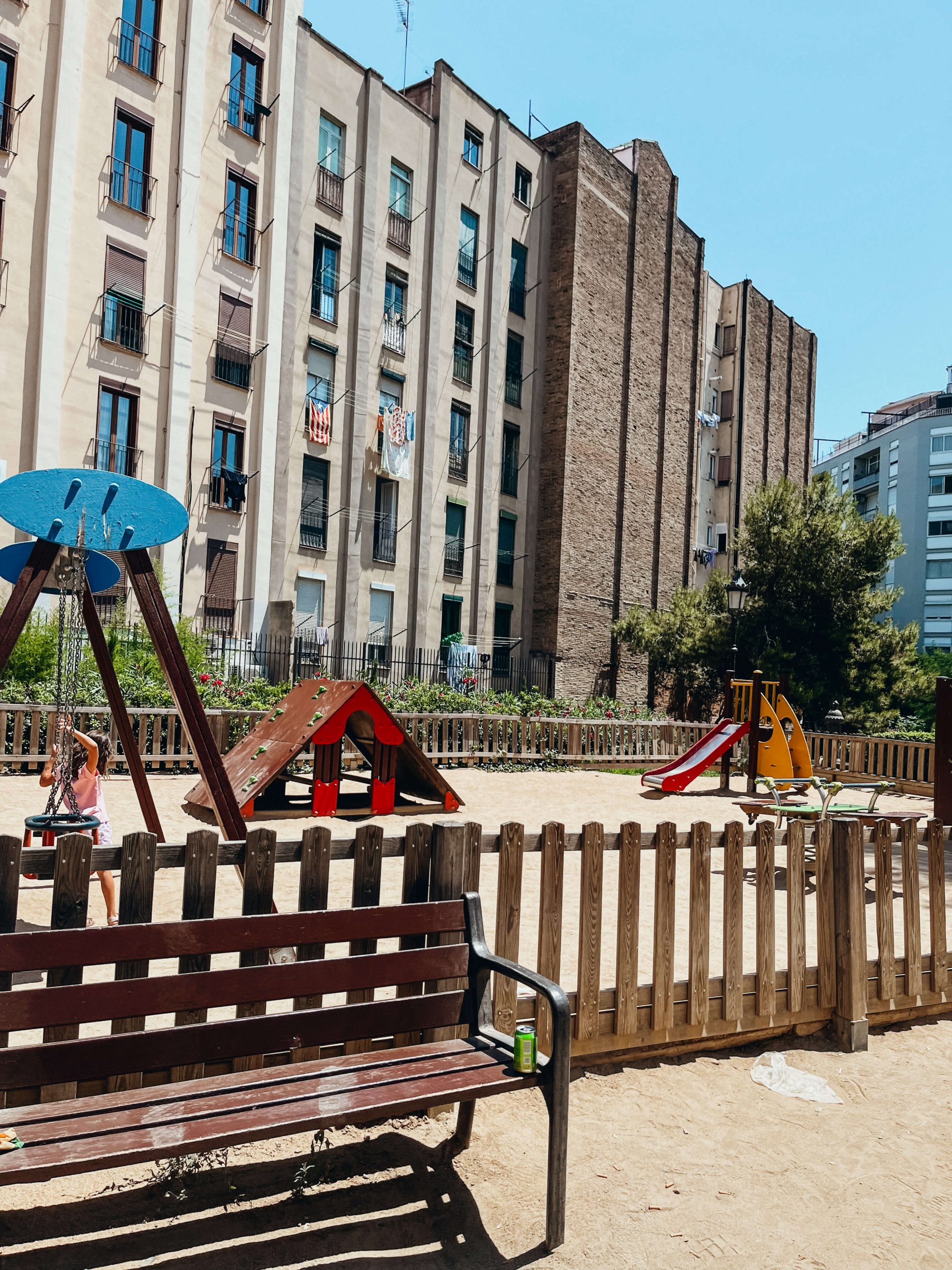 Small playground with wings, slide and climbing structure near Sagrada Familia
