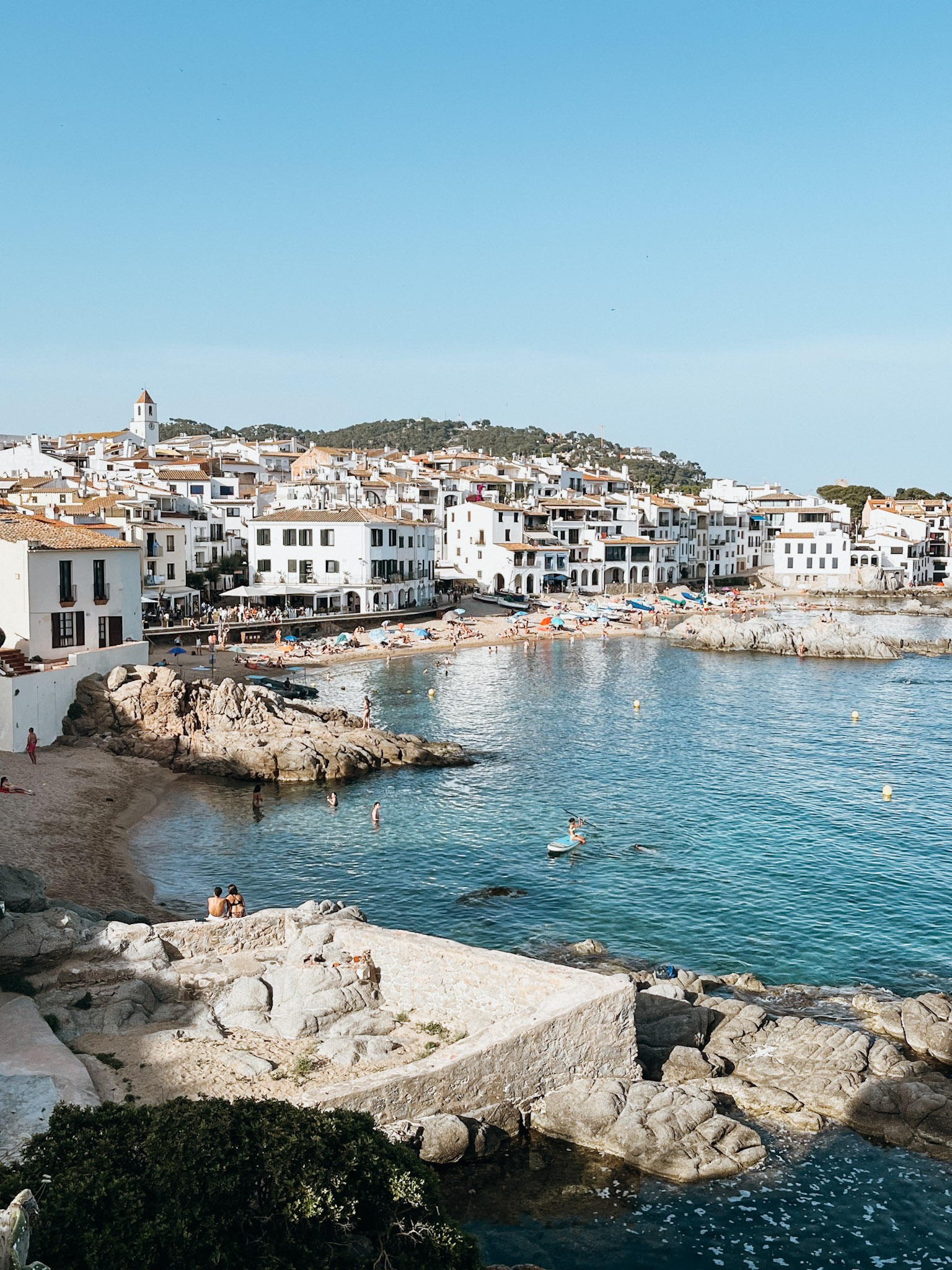 Whitewashed fishing village along the sea in Costa Brava Spain in June